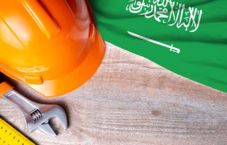 Saudi,Arabia,Flag,With,Different,Construction,Tools,On,Wood,Background,